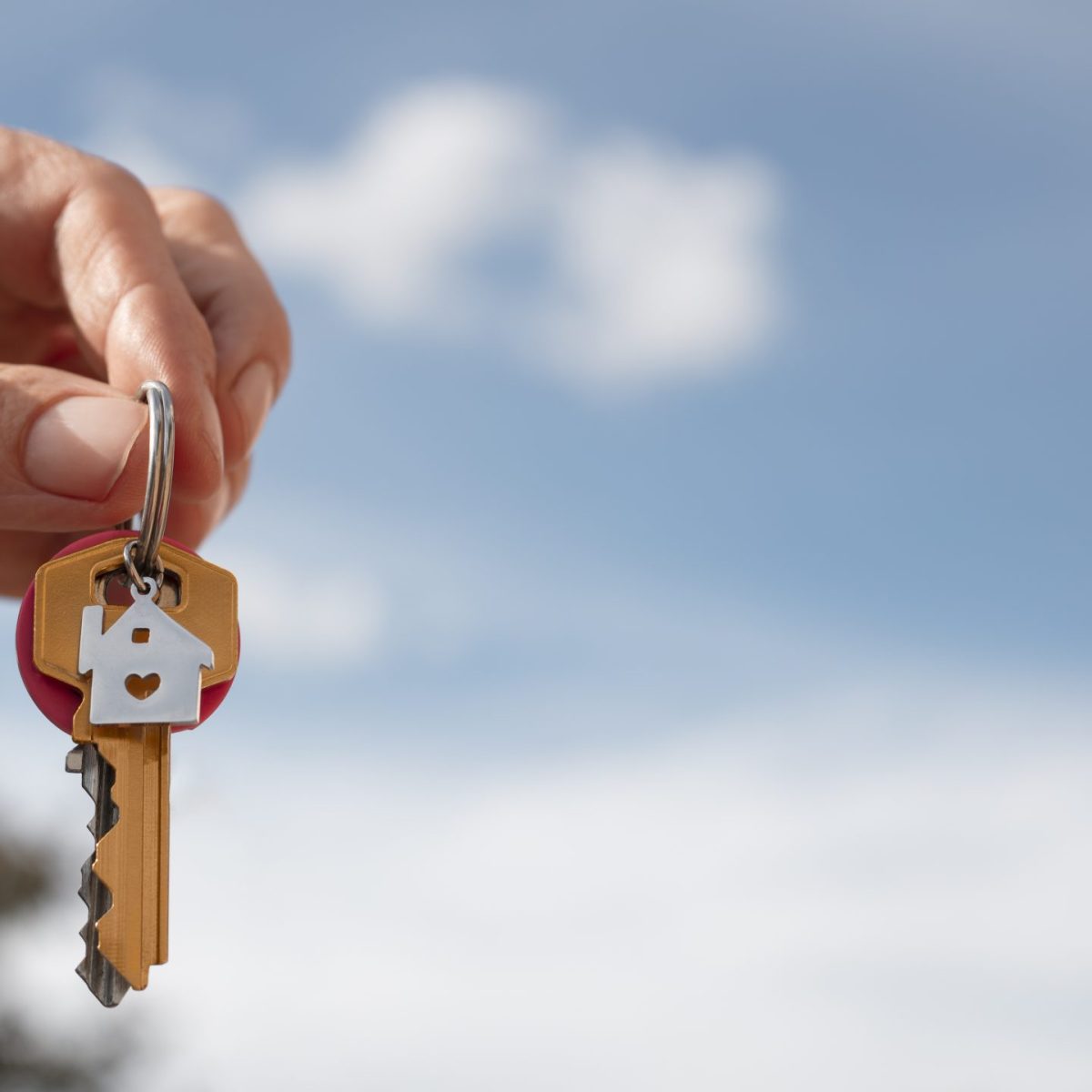 hand-holding-keys-outdoors (1)